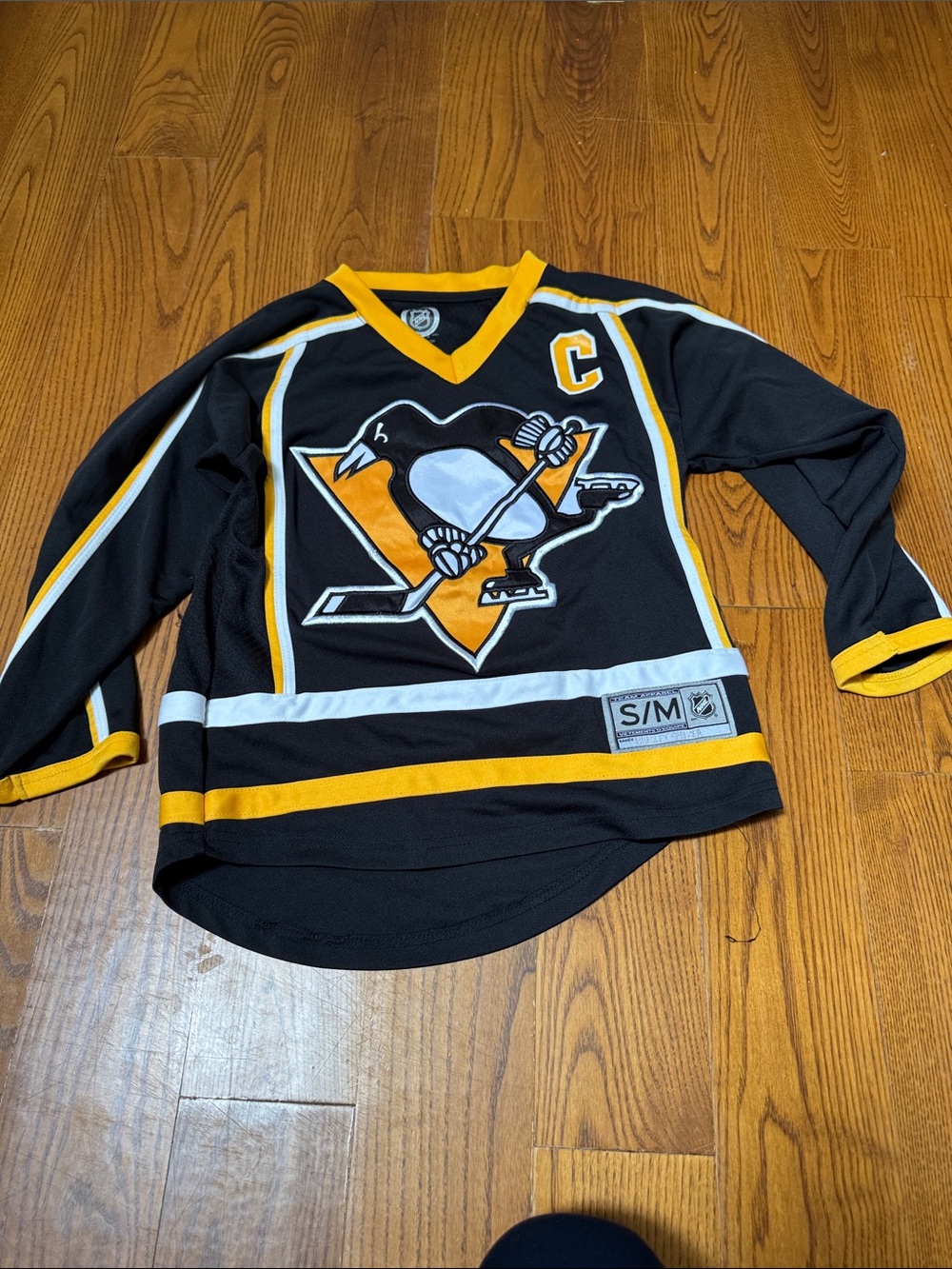 NHL Black and Gold Hockey Jersey Collar Detail
